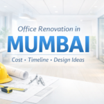 Modern office renovation in Mumbai with open workspace, glass cabins, and bright interior design